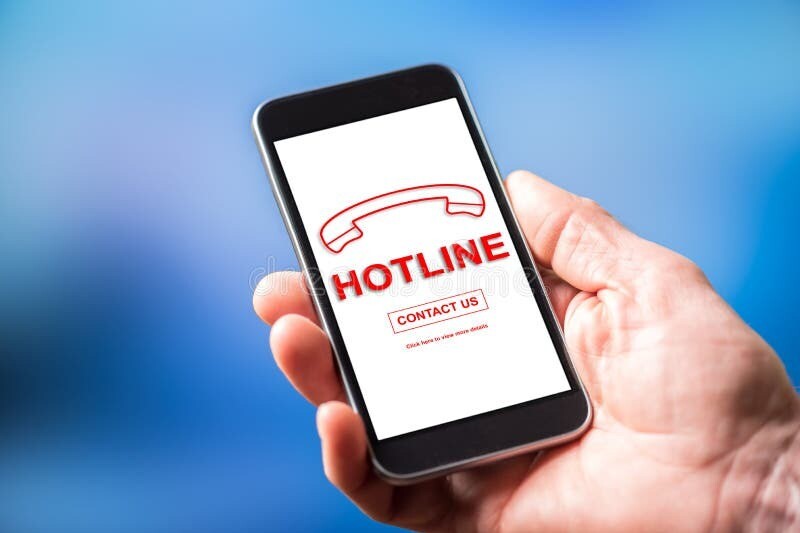 Hand holding a cellphone that says Hotline on the screen